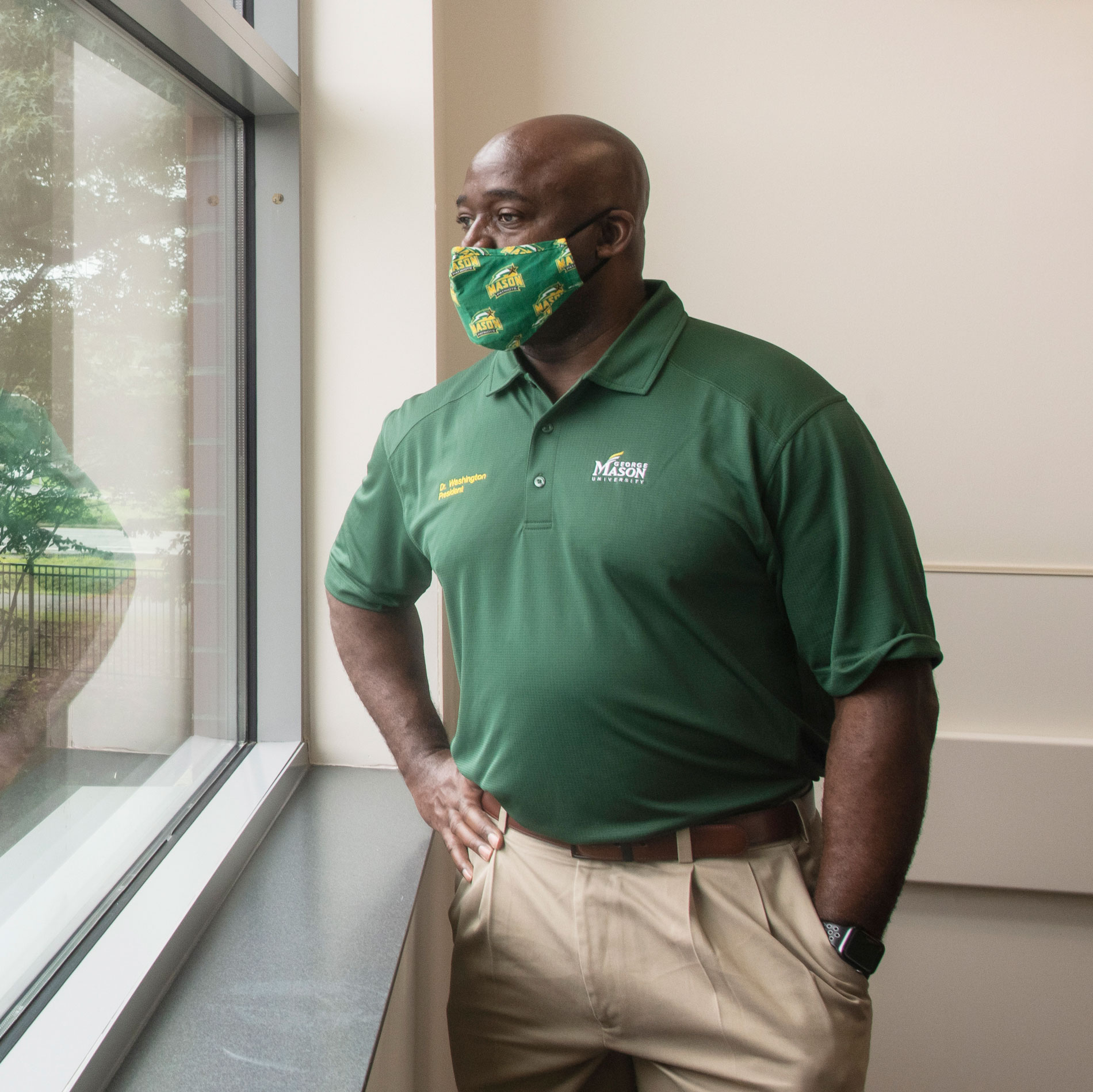 Gregory Washington looks out the window during move in