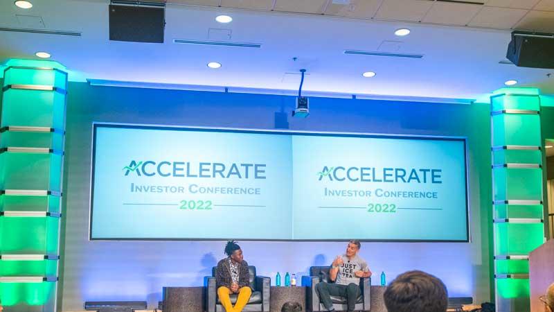 Presenters on stage at the Mason Enterprise Accelerate Investor Conference
